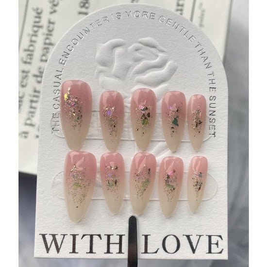 A247 "The new French-style pink fine sparkling almond nails, showing white, pure hand-made press on nail art."